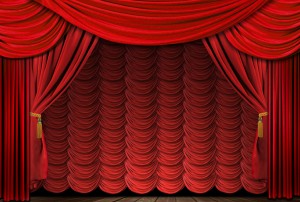 Old fashioned, elegant red theater stage drapes